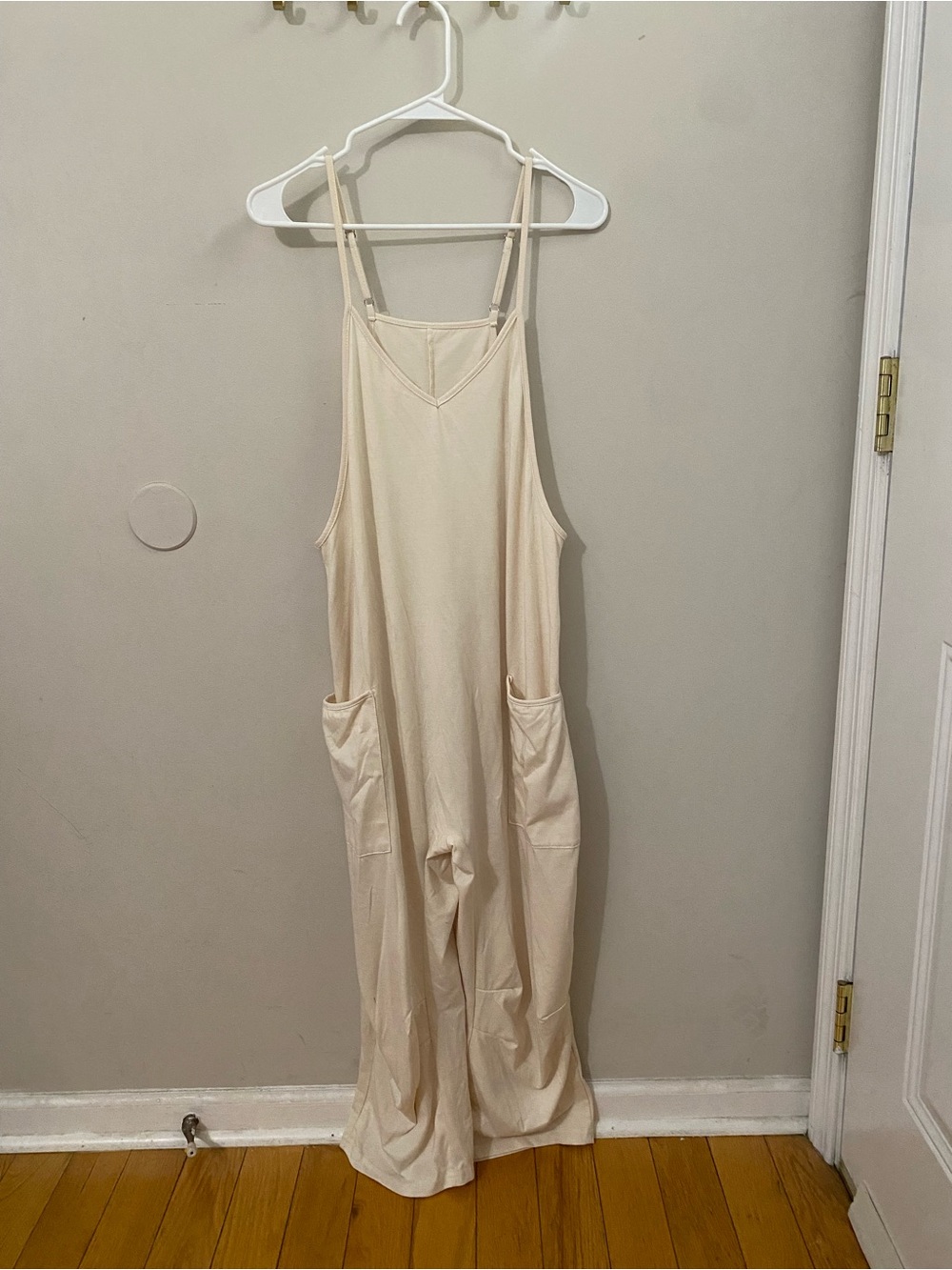 Cream Relaxed Wide-Leg Sleeveless Jumpsuit with Pockets